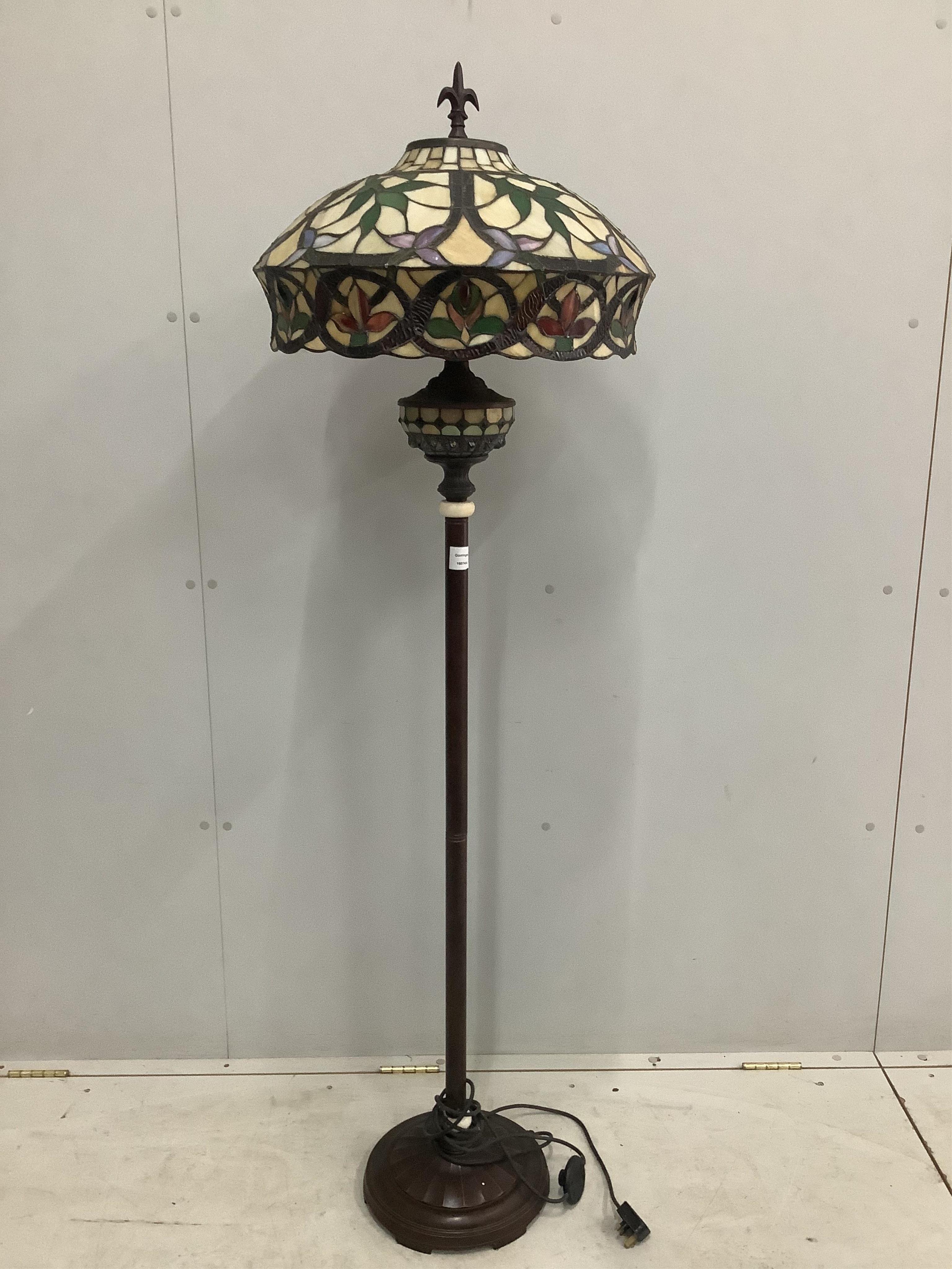 A Tiffany style leaded glass lamp standard, height 164cm. Condition - good